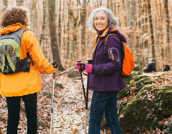 women hiking with walking poles