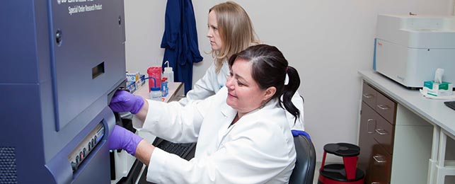 Cytometry Technicians using equipment