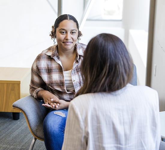 student in a mediation session